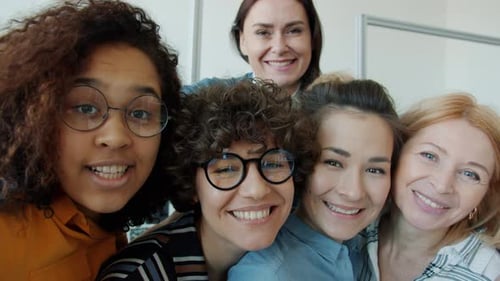 Diverse Women Smiling Together Indoors Close-Up