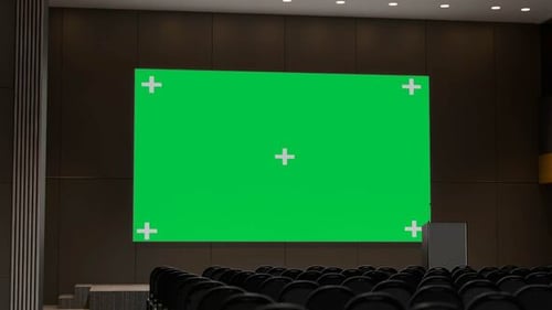 Green Screen Display in Modern Corporate Auditorium for Presentations