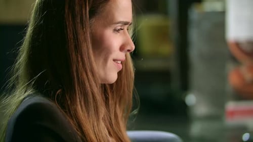 Focused Woman Working Laptop Computer in Office. Portrait of Business Woman