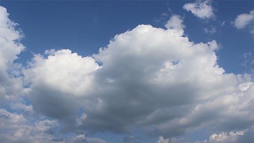 Puffy Clouds On Blue Sky Timelapse