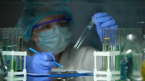 Medical Professional Works in a Lab