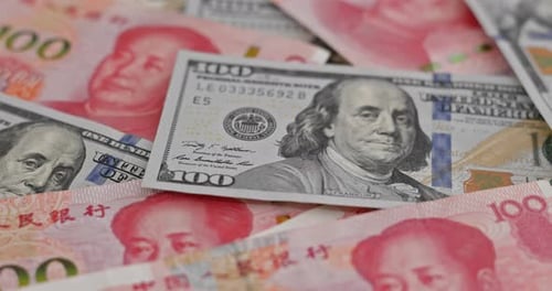 Currency Featuring American Dollars and Chinese Yuan