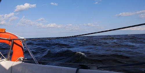View of the Sea from a Sailboat on Water