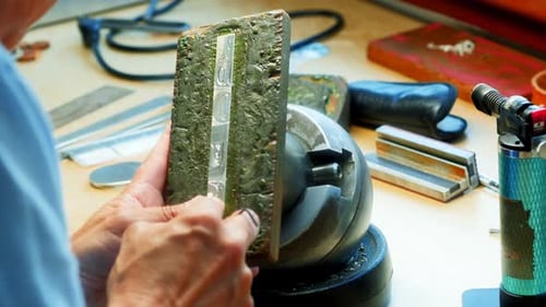 Craftswoman working in workshop