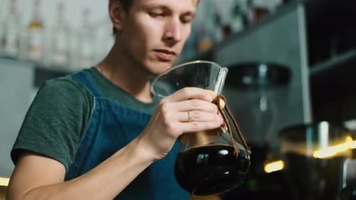 Barista enjoying the aroma of Filter coffee.