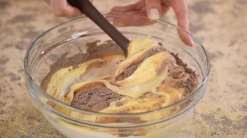 Stirring Batter in a Glass Bowl