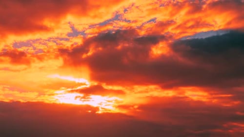 Sunset Cloudy Sky With Fluffy Clouds