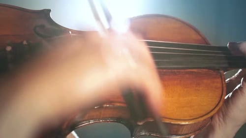 Close Up of Violin Being Played with Bow