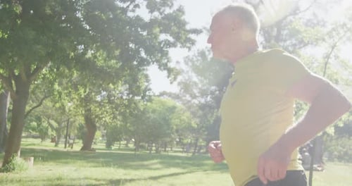 Senior man running in the park