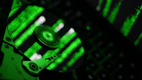 Computer Hard Drive with Abstract Green Code
