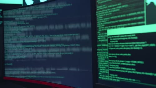 Code On Multiple Computer Screens, Cyber Attack