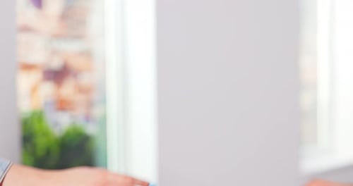 Close Up of Male Hand Passing Key to Female Indoors in New Apartament