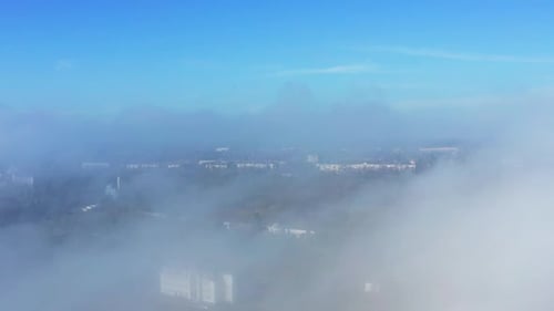 View of the city through the clouds.