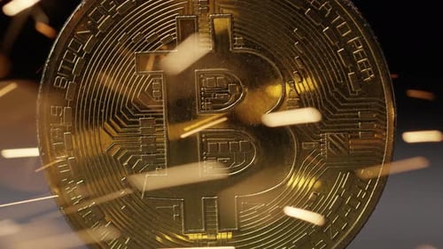 Cryptocurrency on the block chain - close up of bitcoin altcoin physical coins in dynamic setting