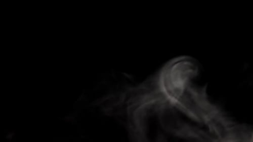 Swirling White Smoke on Black Background