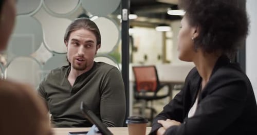 Business Meeting in Modern Office with Diverse Team