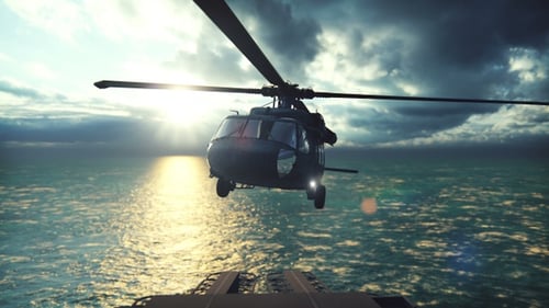 Hubschrauber landet auf einem Träger