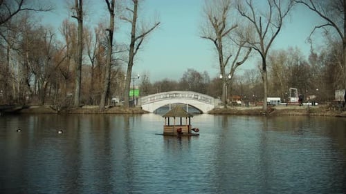 Bird House in the Gorky Park in Moscow, Russia moving around the lake in a time-lapse video.