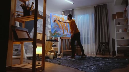 Inspired Artist Painting with Roller