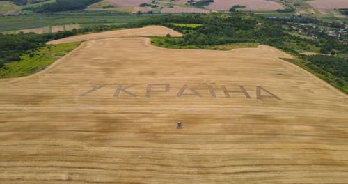 Word Ukraine Plowed A Tractor In The Field