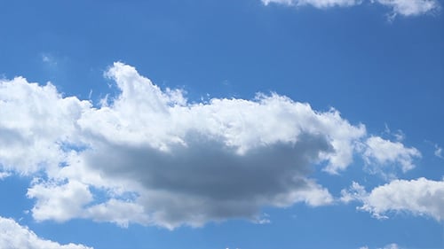 Clouds Drifting Across a Blue Sky Time-lapse