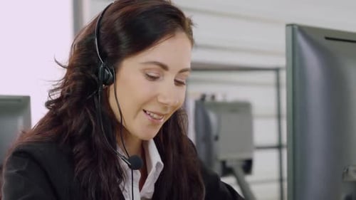 Business People Wearing Headset Working in Office