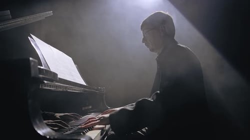 Pianist Plays Piano in Dramatic Spotlight