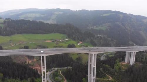 Aerial View of the Highway Viaduct on Concrete Pillars in the Mountains