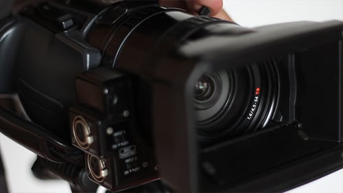 Close Up of Video Camera Being Adjusted