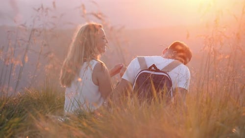 Couple having fun at sunset