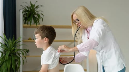 Senior Female Doctor Pediatrician Nurse Wear White Coat Listening Heartbeat Exam Cute Little Patient