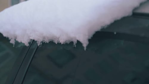 Modern Car Covered with Thick Snow Layer After Snowfall