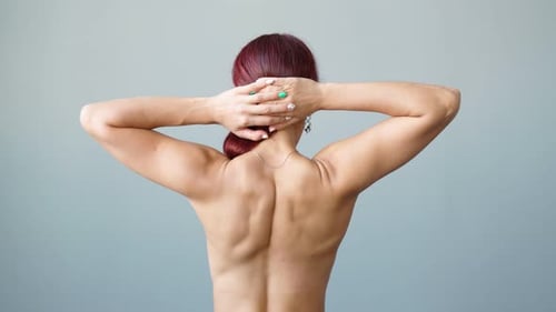 Woman Doing Shoulder Stretches for Exercise