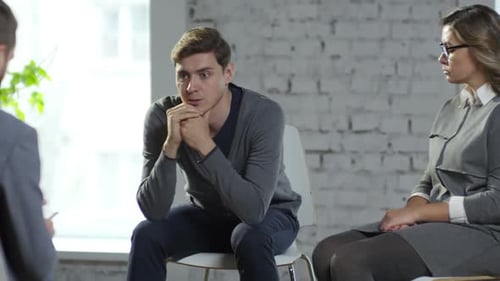 Adults Talking During a Group Therapy Session