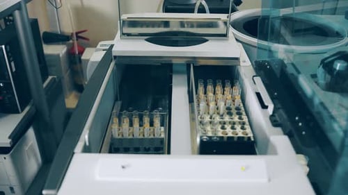 Automated Laboratory Analyzer Testing Vials in Hospital