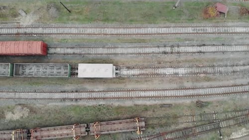 Drone top view of empty train tracks in industrial city part