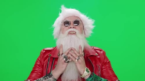 Freaky Santa Claus on a Green Background Funny Santa Arranges a Performance Chroma Key Template Freaky Santa Claus on a Green Background Funny Santa Arranges a Performance Chroma Key Template