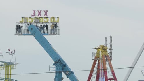 A Shot of a Funfair with Rides