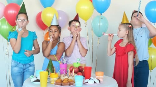 Kids Celebrating at a Birthday Party