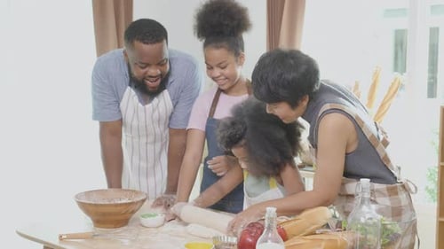 Family Baking Bread Together in the Kitchen