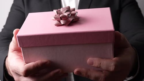 Holding Gift in Hands