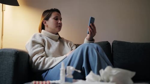 Woman at Home Using Telehealth for Medical Advice