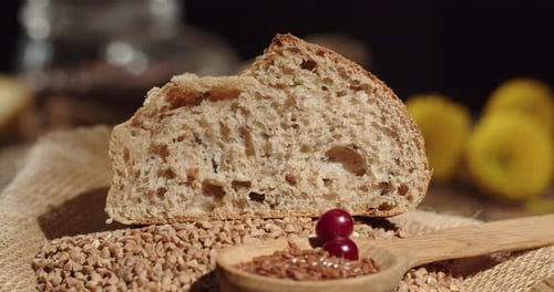 Buckwheat And Flax Bread Is Laid Out On The Table. A Piece Of Bread On The Table For Breakfast