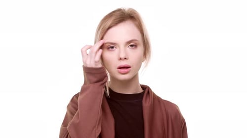Attractive Blonde Woman Posing on White Background
