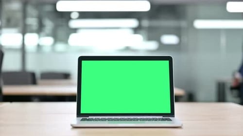 Laptop with Chroma Screen on Tablet in Office