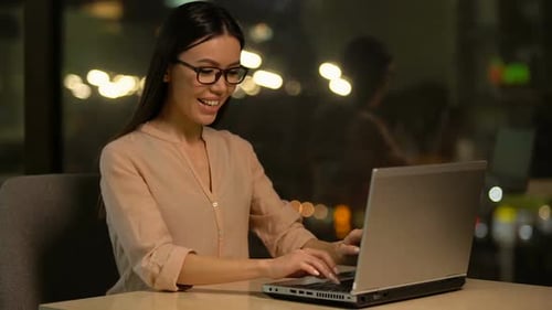 Excited Girl Corresponding on Social Media, High-Speed Internet Connection