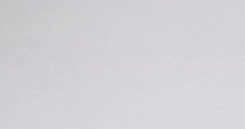 Close Up of Red Approved Stamp on Paper