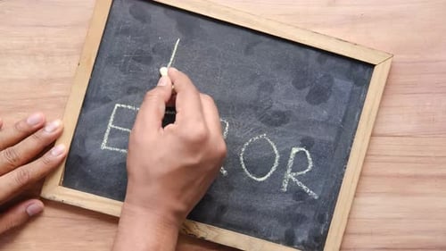 404 Error Message Written on Chalkboard Close Up