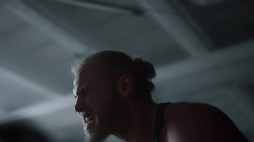 Weightlifter Shouting and Working Out