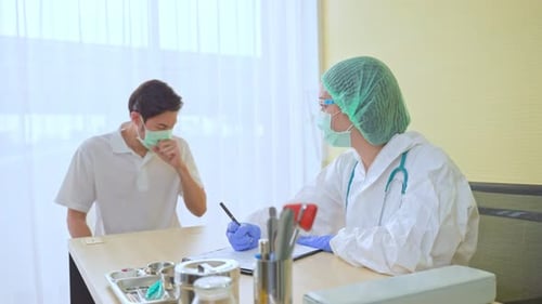 Young male patient visit hospital medical clinic for a check up consult with female doctor in clinic